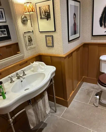 Bathroom finished with painted timber panelling