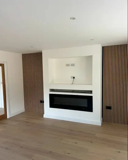 Slatted panelling and inset fireplace wall, painted and finished